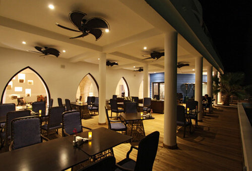 Reataurant and bar area at the Arkin Palm Beach Hotel