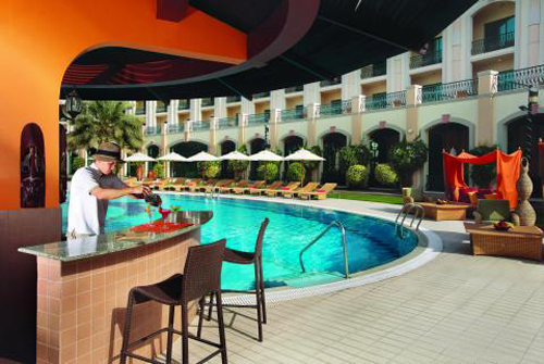 Pool area at the Al Ain Rotana Hotel