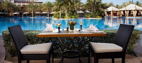 Pool area at the Al Qasr Hotel